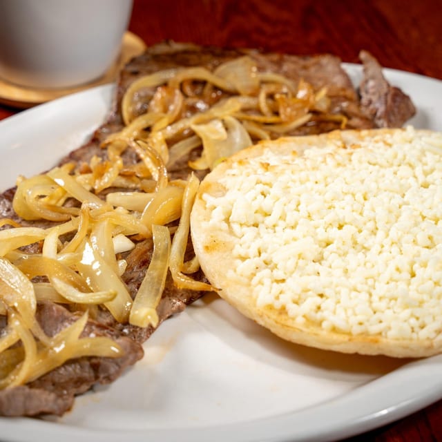 Steak with Onions (Carne Encebollada).