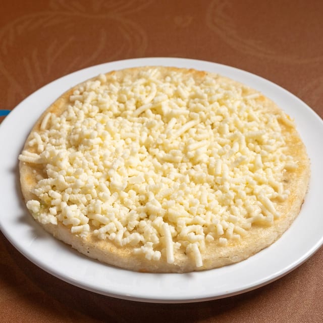 Arepa with Cheese (Arepa con Queso).