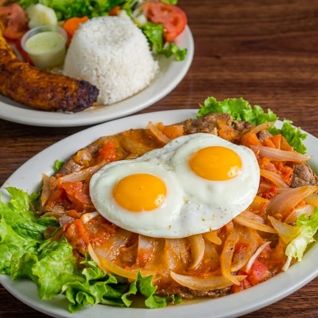 Steak on Horseback (Bistec a Caballo).